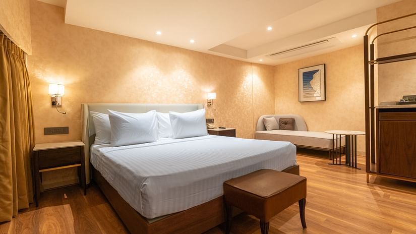 an image of an executive room with a bed and a sofa at Clarks Inn Suites Hyderabad