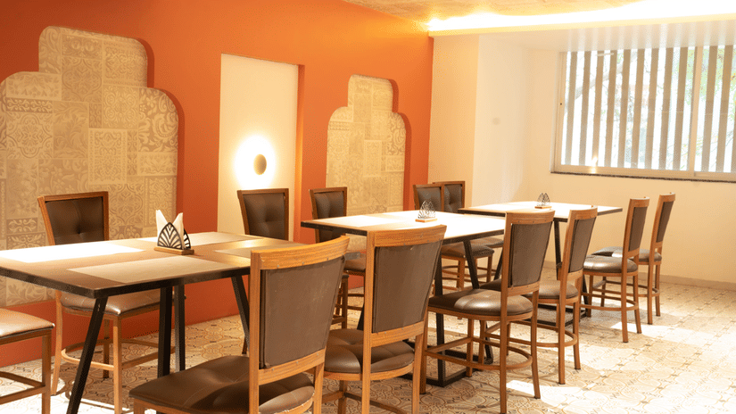 Restaurant seating at Magnus Lxia Premier, Kalyani Nagar with modern décor and comfortable dining setup.