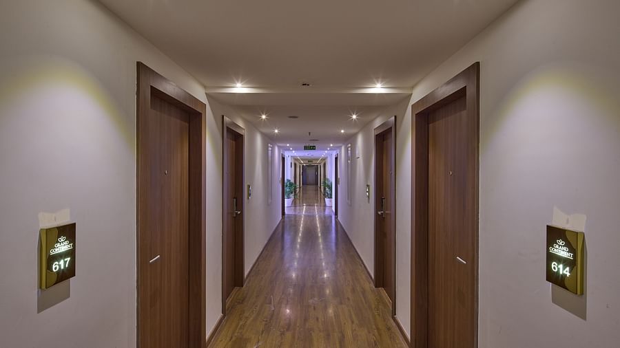 An illuminated corridor with ambient lighting and stylish decor - Grand Continent, Brookefield