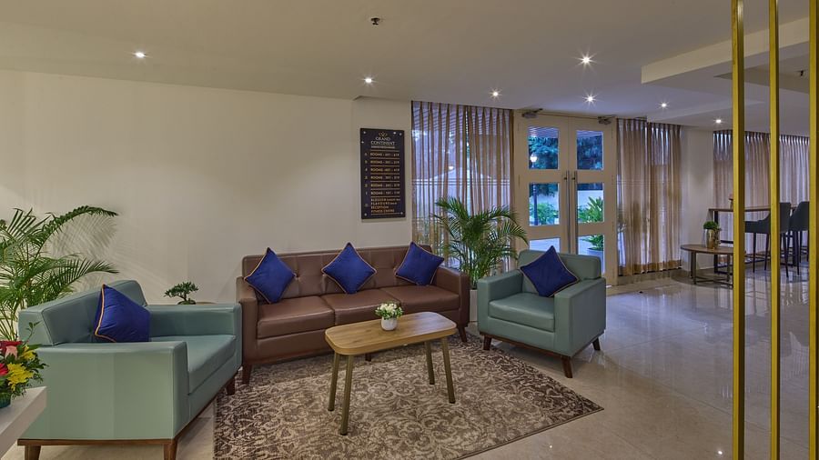 A chic lounge with plush sofas, accent pillows, and a central coffee table - Grand Continent, Brookefield