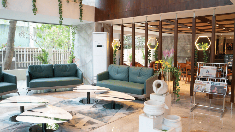 Stylish lobby seating area at Magnus Lxia Premier, Kalyani Nagar with modern décor and natural light.
