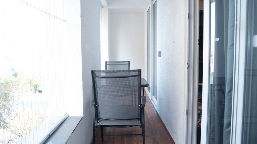 Balcony view at Magnus Lxia Premier, Kalyani Nagar with outdoor seating and natural light.