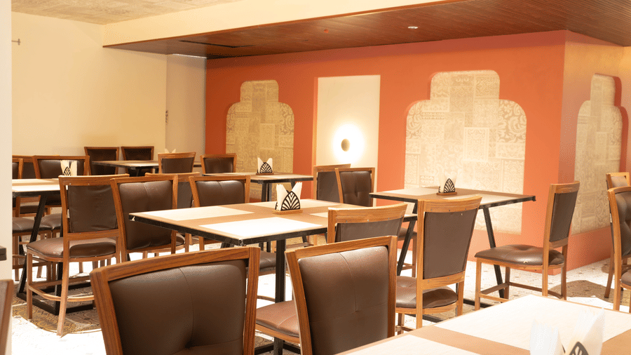 Elegant dining space at Magnus Lxia Premier, Kalyani Nagar with well-lit interiors and organized seating.
