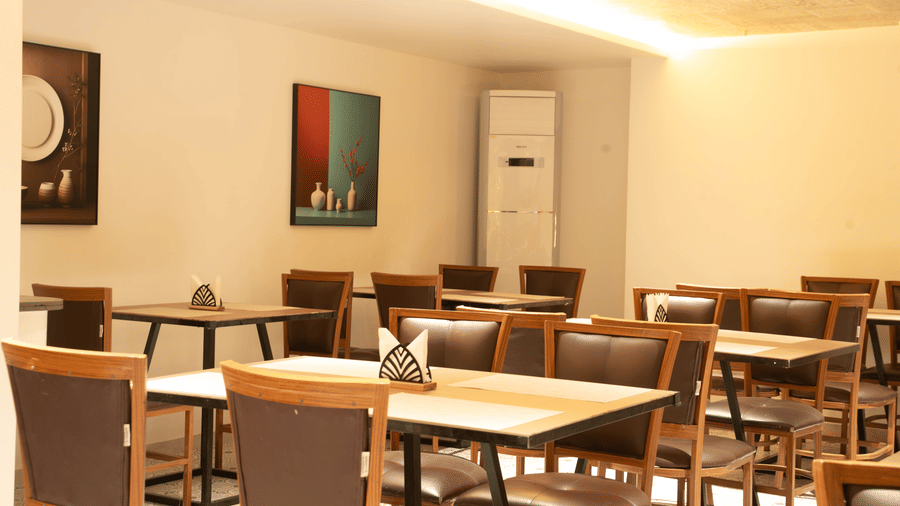 Contemporary restaurant area at Magnus Lxia Premier, Kalyani Nagar with minimal décor and cozy ambiance.