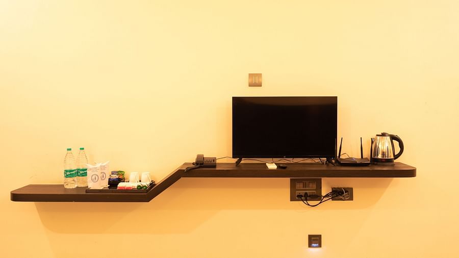 A tv kept on the shelf inside deluxe ac room - Mastiff Select Terrain