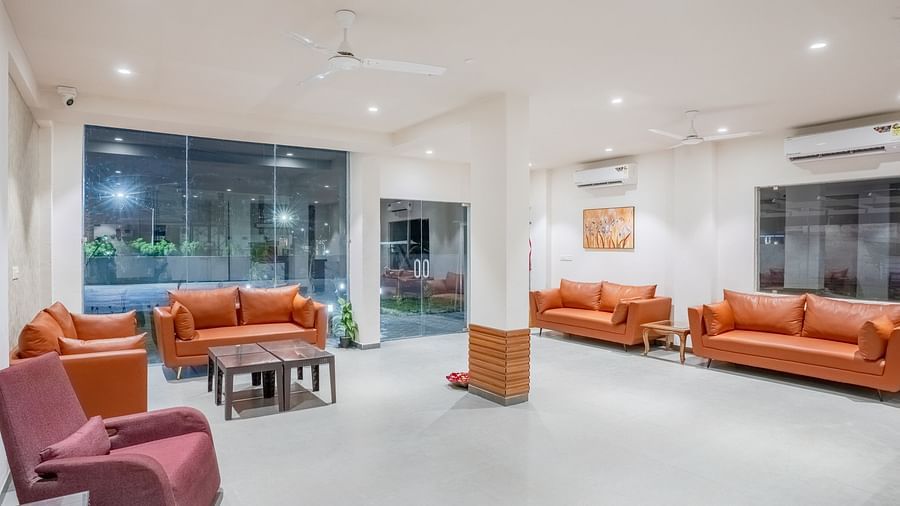 a view of the reception area with chairs at Pride Elite Becharaji