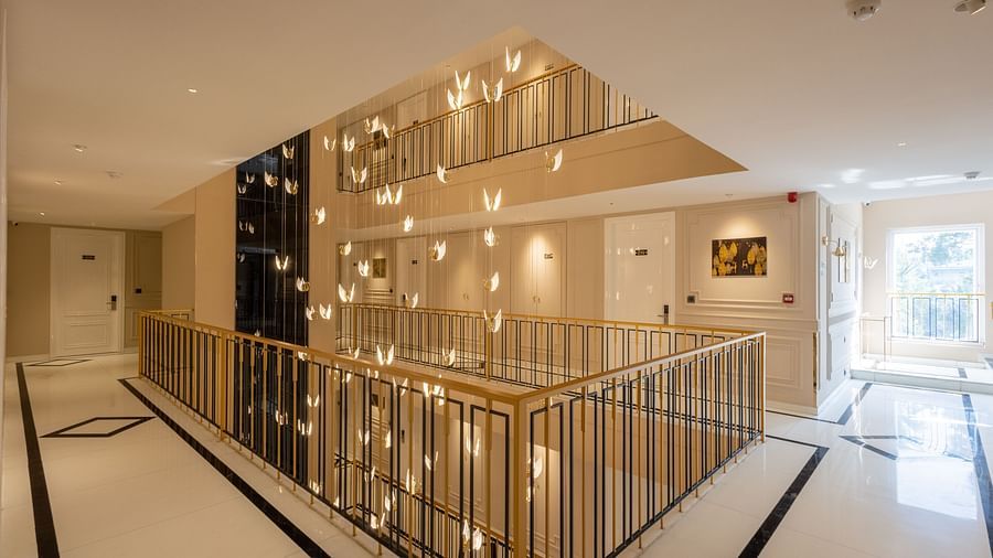 A view of well-lit interiors with golden lights | Renest Calangute, Goa