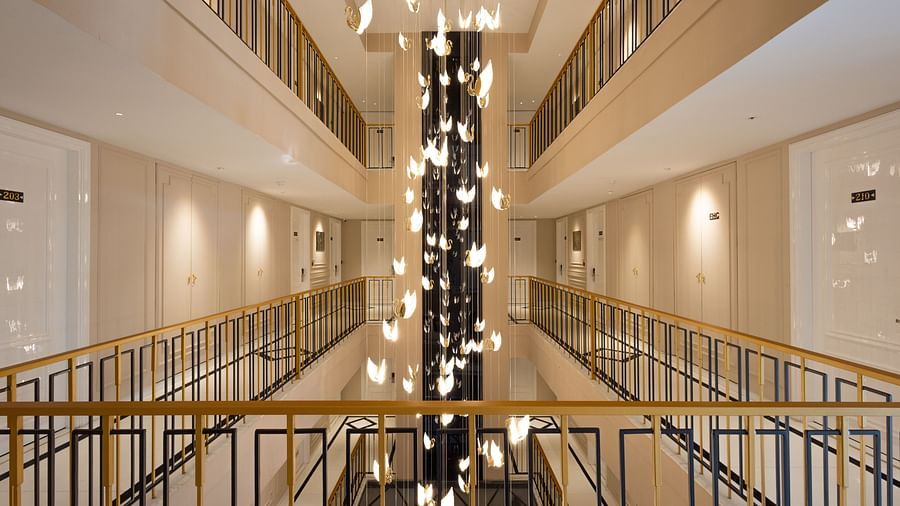A view of well-lit interiors with golden lights | Renest Calangute, Goa