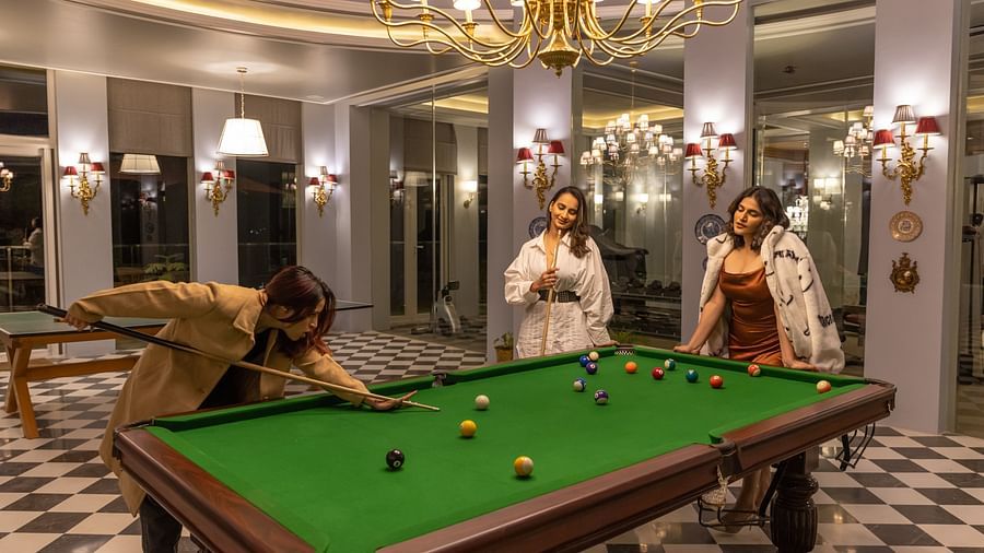 Three women playing snooker  - The Manor Luxury Hotel, Shimla