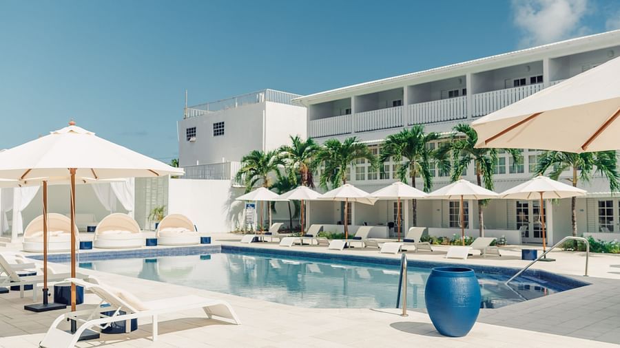 Soco House - the view of the pool with pool beds lining the pool