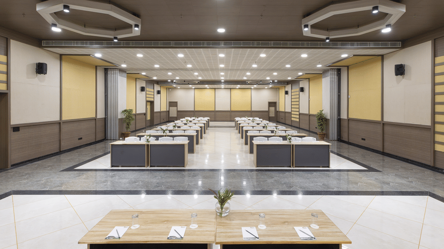 Spacious hive indoor venue with modern seating at The Golden Tusk, Jim Corbett