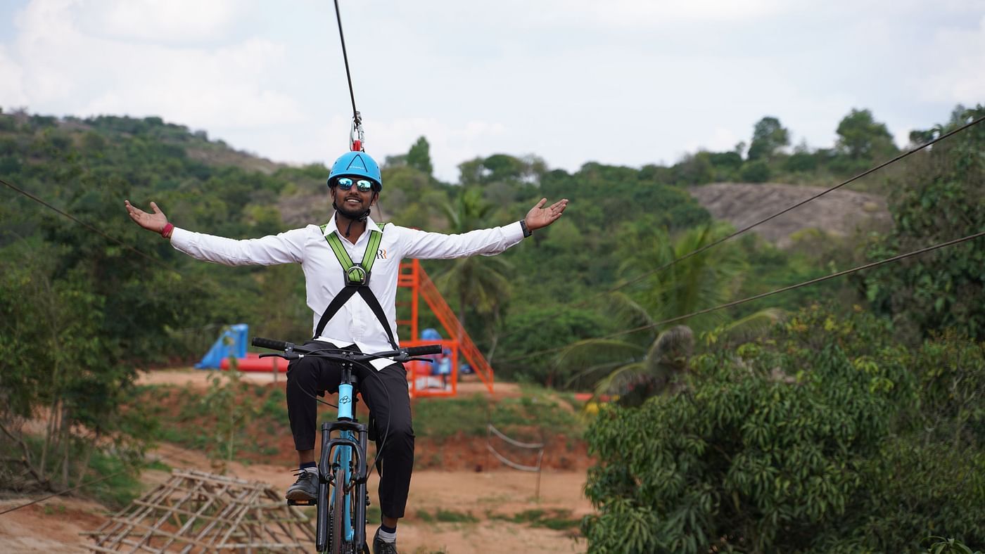 A man enjoying zip cycling at Ravishing Retreat