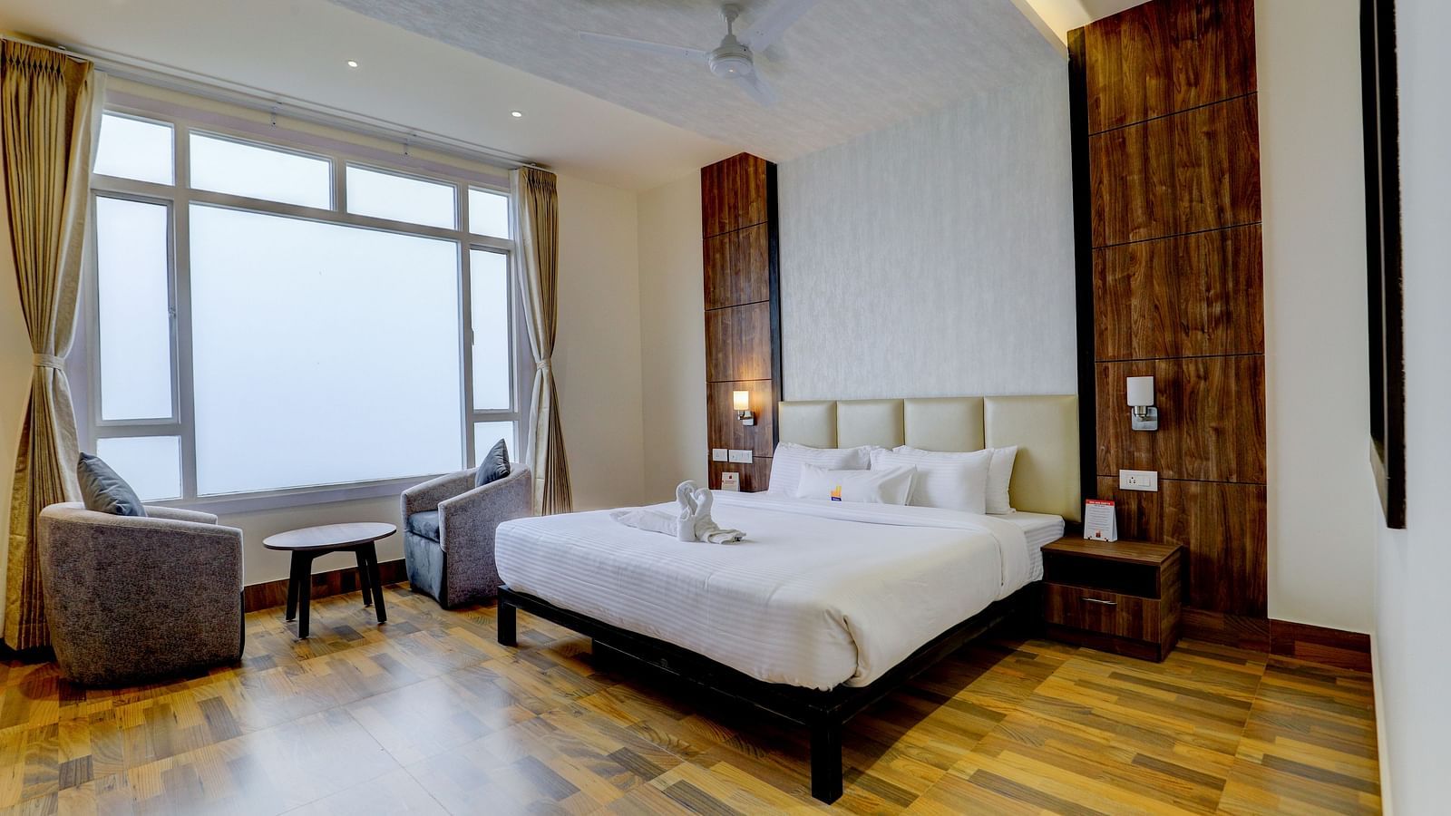 view of king size bed and TV of a Deluxe Room Banari Regency by Summit, Namchi
