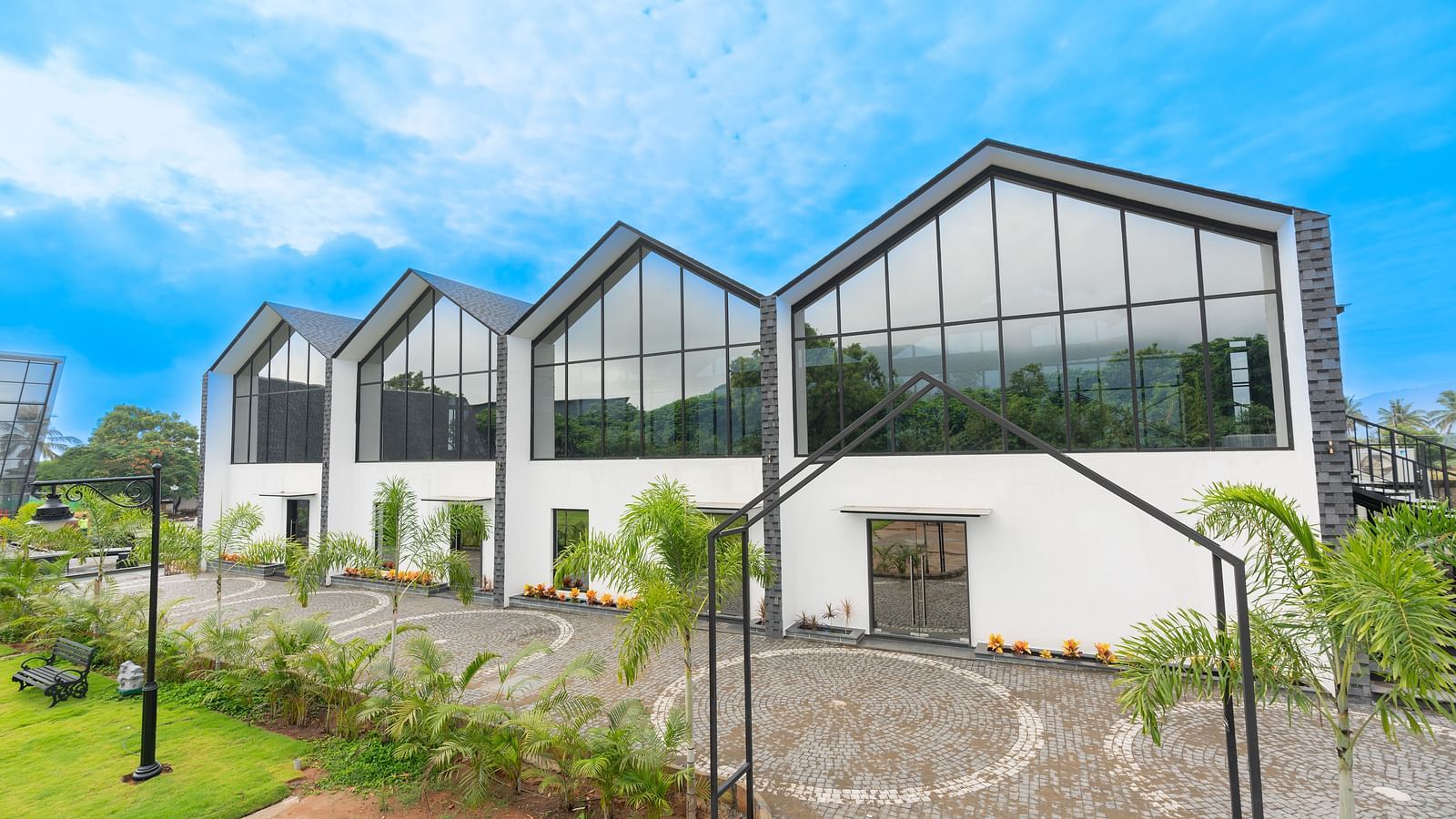 Facade view of the blue moon venue on a bright morning at Darza Resorts.