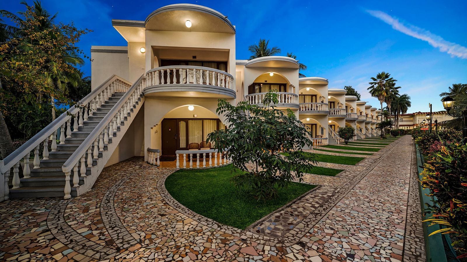A facade image River View Room with balcony showcasing the trail that leads the way to other rooms - GReaT Trails River View Resort Thanjavur By GRT Hotels
