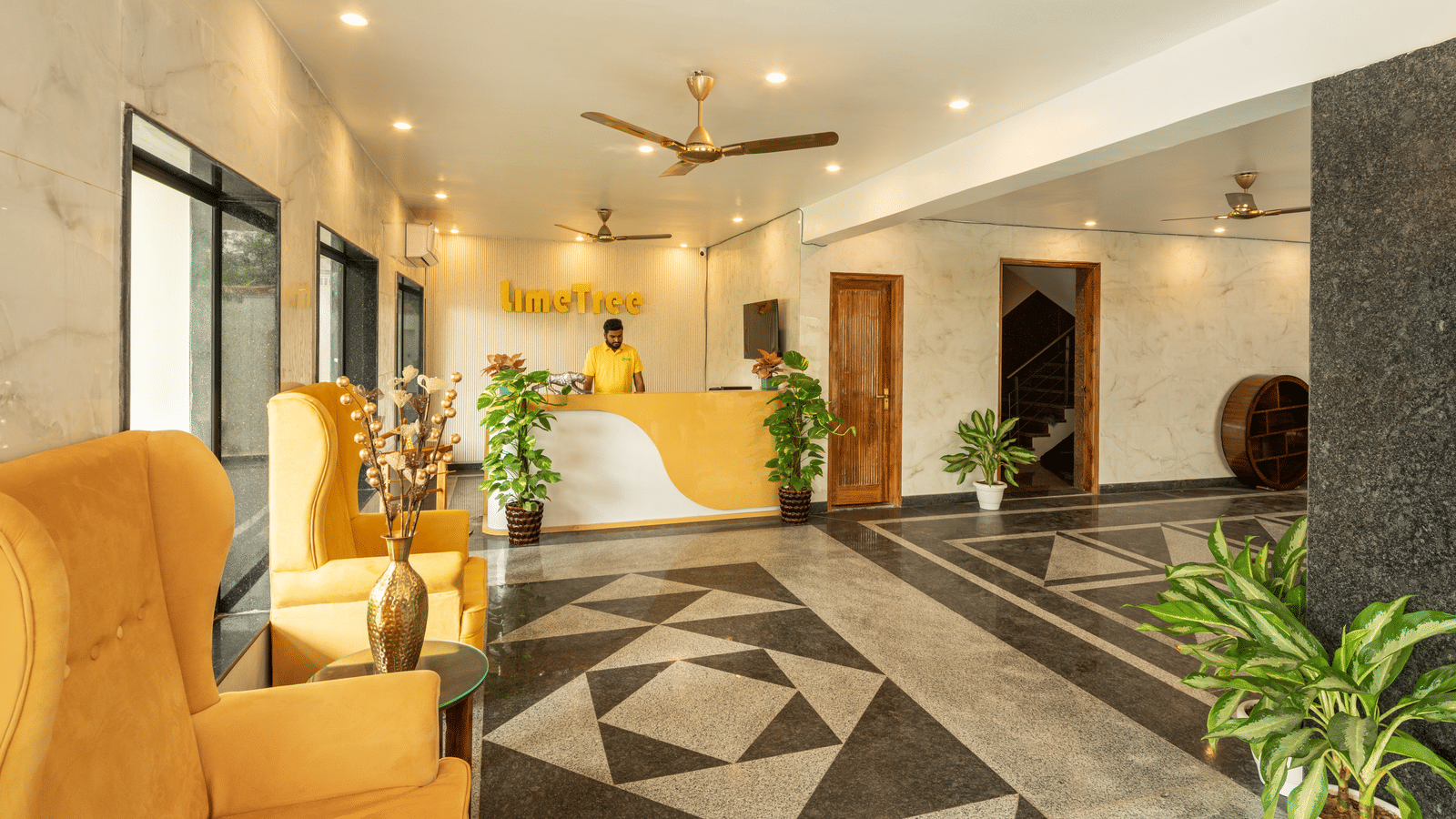 Elegant hotel lobby with comfortable seating and modern decor.