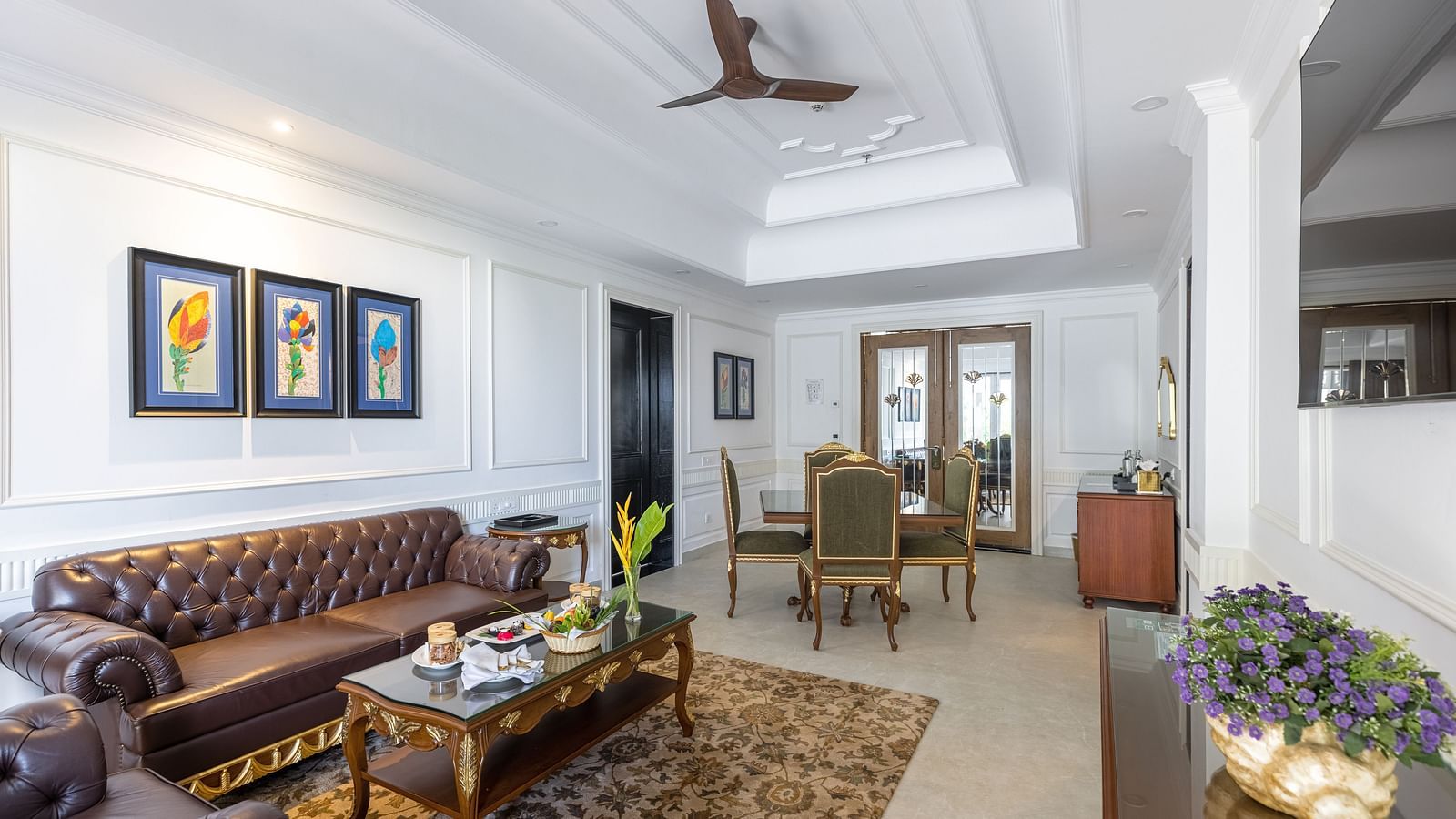 Elegant living and dining area with classic decor at MAYFAIR Palm Beach Resort, Gopalpur-On-Sea.