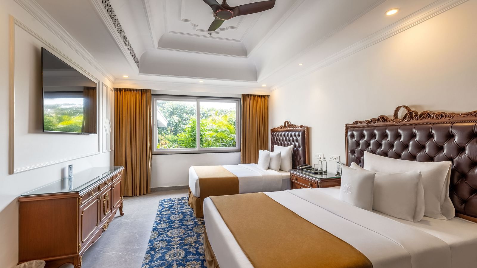 Spacious suite with cosy twin beds and bright interiors at MAYFAIR Palm Beach Resort, Gopalpur-on-Sea