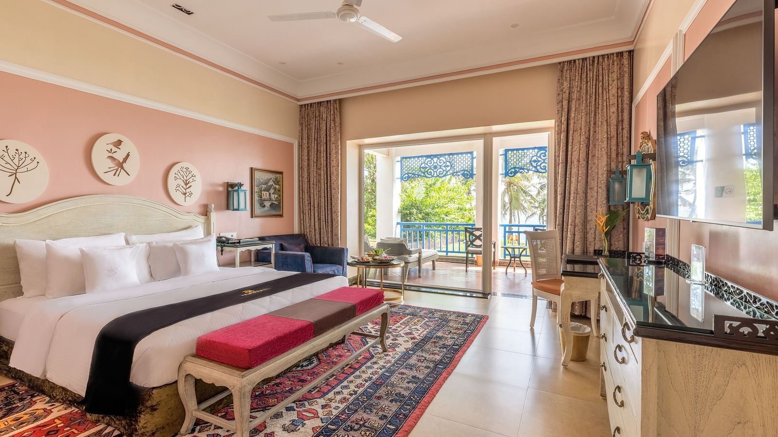 Twin-bed room with pastel tones and balcony access at MAYFAIR Palm Beach Resort, Gopalpur-on-Sea