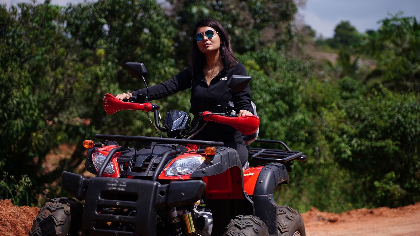 A guest riding the atv bike at Ravishing Retreat 