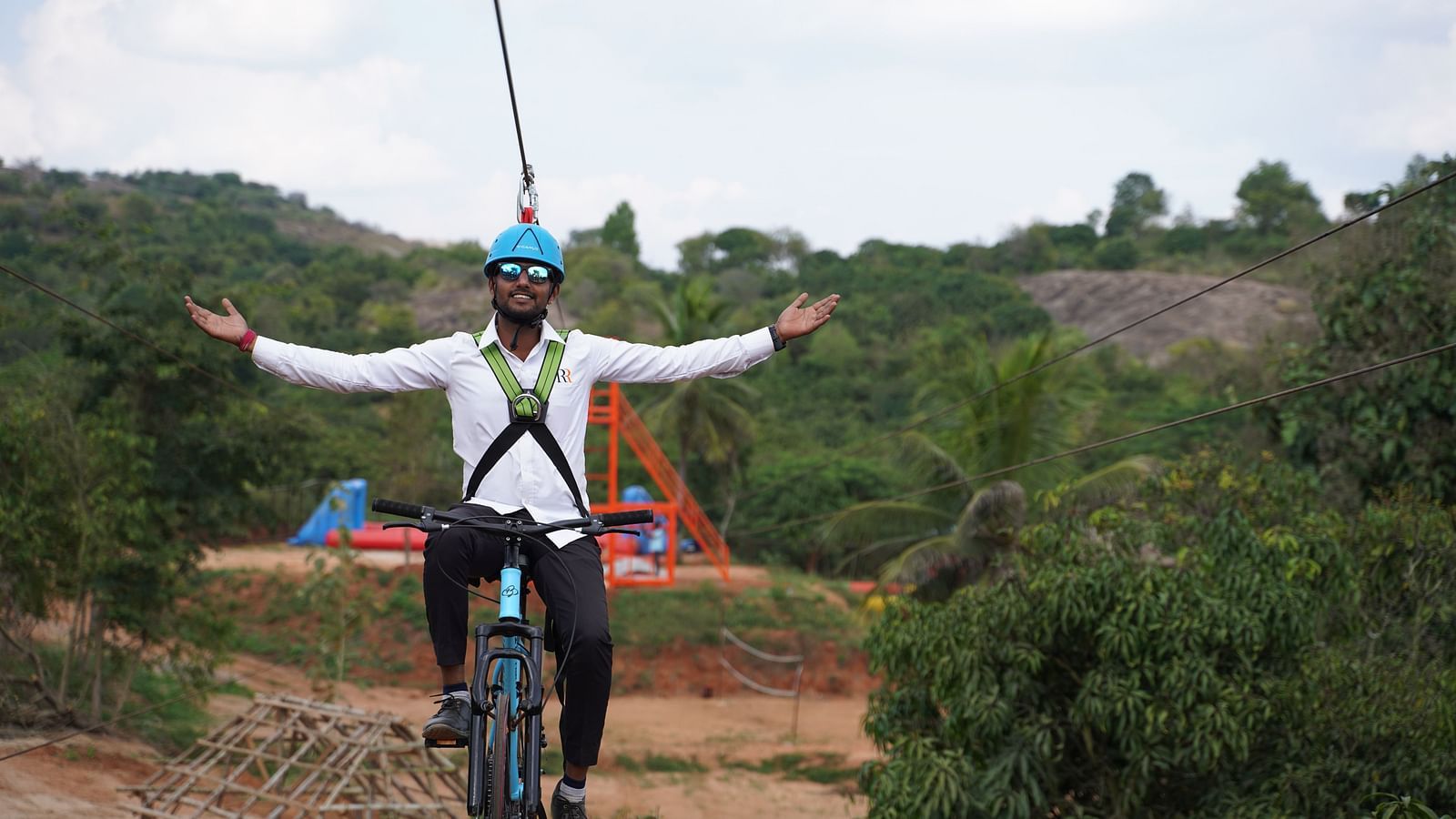A man enjoying zip cycling at Ravishing Retreat