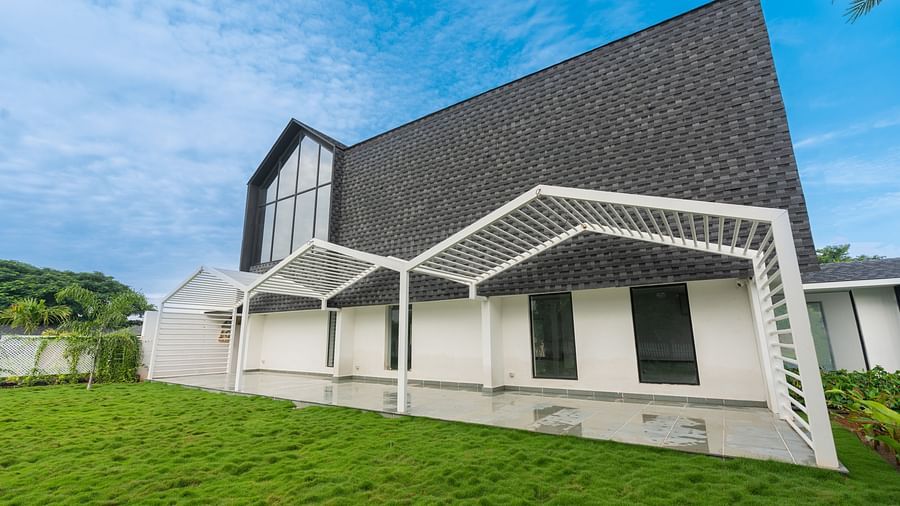 a close up image if the buffet shed in front of a green lawn at the love letter - Darza Resorts