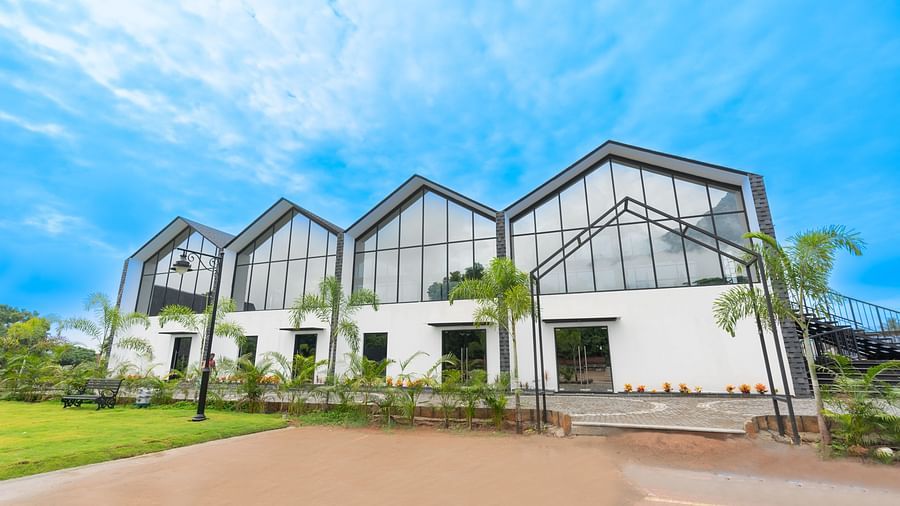 front view image of the blue moon event space with with white coloured walls - Darza Resorts