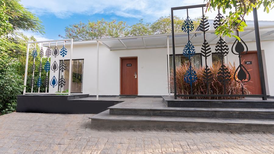 exterior facade image of the family villa two bedroom with small steps in front of it - Darza Resorts