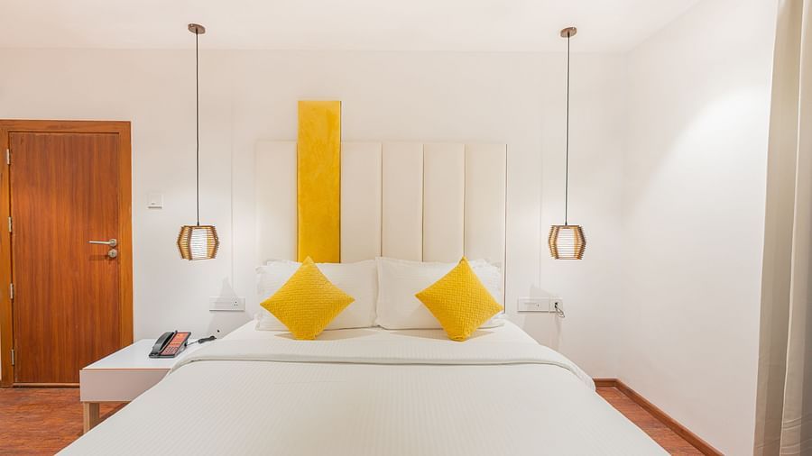 front view image focusing on the double bed in the family villa two bedroom - Darza Resorts
