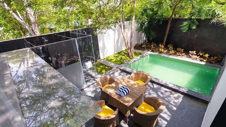top view image of the family villa two bedroom featuring the outdoor seating area along with the private swimming pool - Darza Resorts