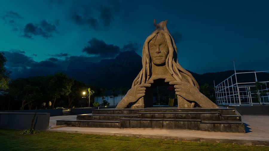 image of the tifity square of a woman with a beautiful teal coloured sky in the background - Darza Resort