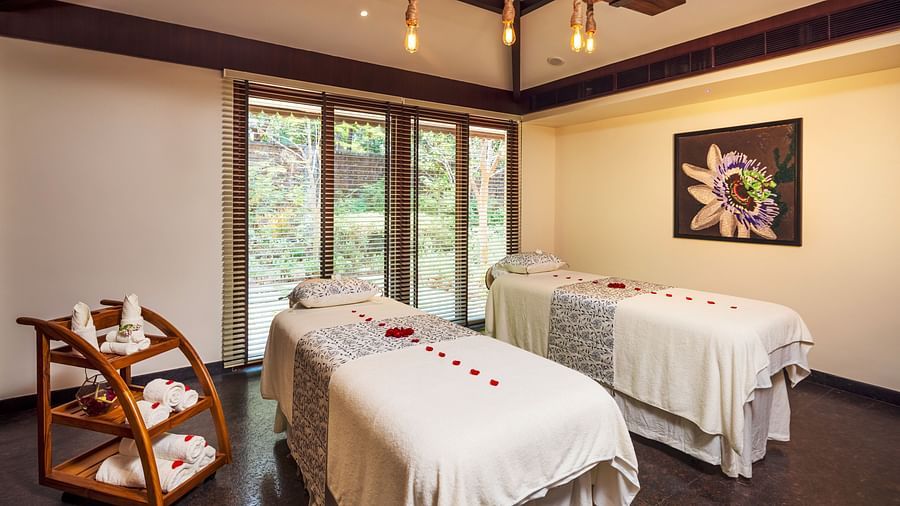 A massage room with two massage tables for couples massage - Gamyam Retreat