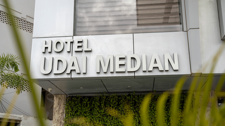 Facade shot of Hotel Udai Median, Udaipur with greenery in the front.