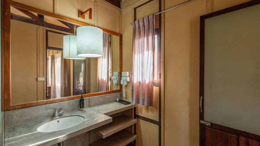 Superior Washroom  with a mirror and washbasin