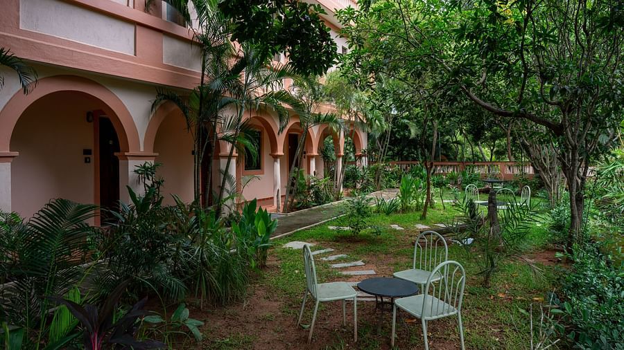 Interior of a Resort property with seating arrangement of table and chairs.