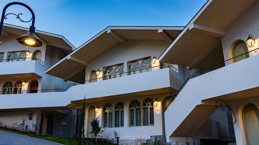 Side view of the rooms with a street lamp in view | Mango Hill Shola, Ooty