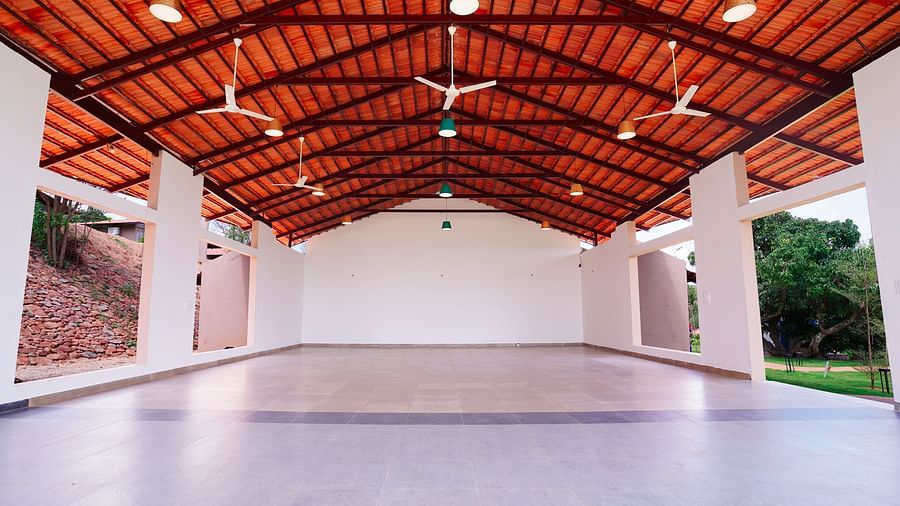 The white interiors and brown roof of our banquet hall near Bangalore - Ravishing Retreat, Harisandra