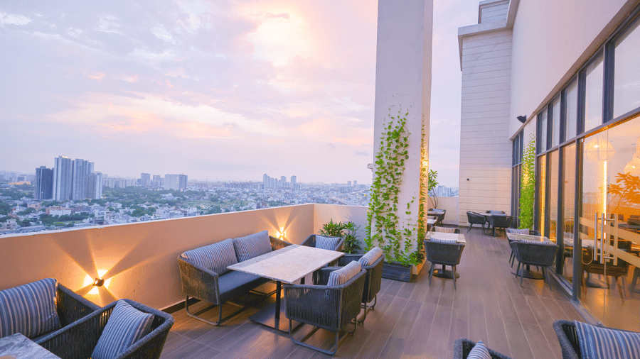 An overview of the Al-fresco seating arrangement at SKY Club of Rhythm Gurugram.