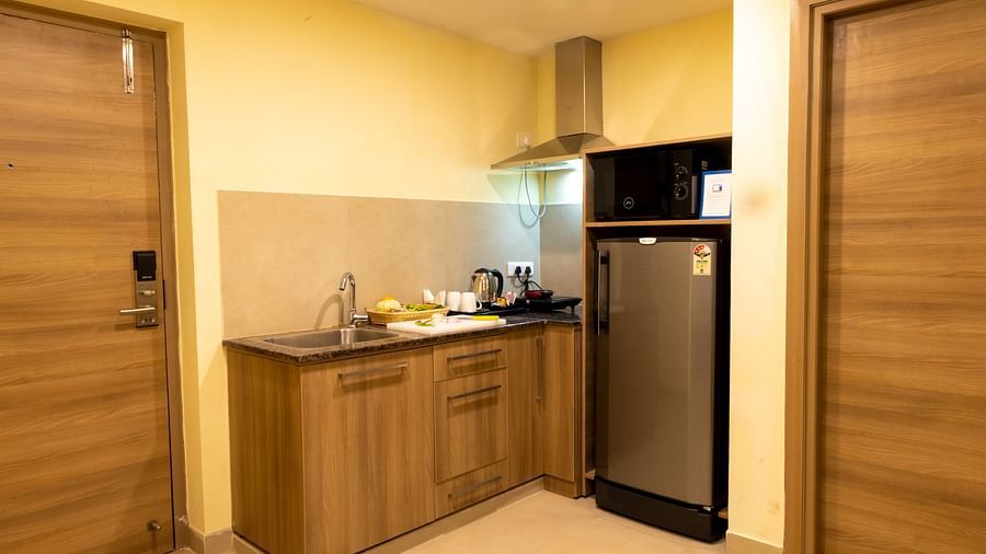 Overview of the kitchenette inside Deluxe Two Bedroom Suite - Starlit Suites, Tirupati