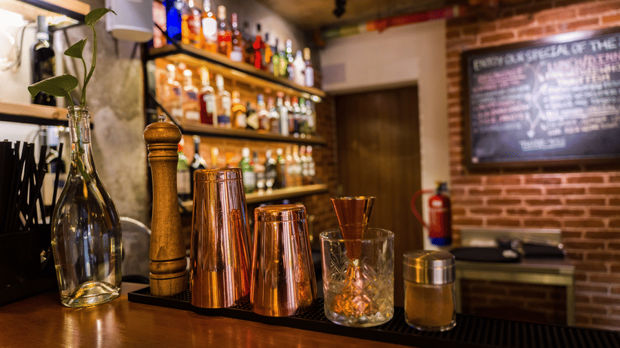 The counter at the community bistro at The Nanee is adorned with antique items used as decorations.