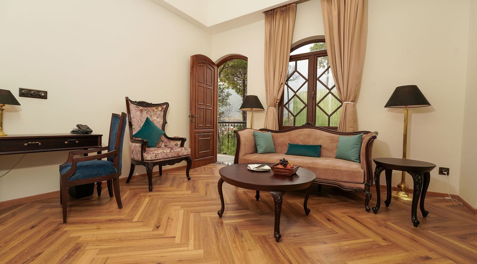 Seating area with a sofa in the living room at INFINITEA Dak Bungalow, Palampur