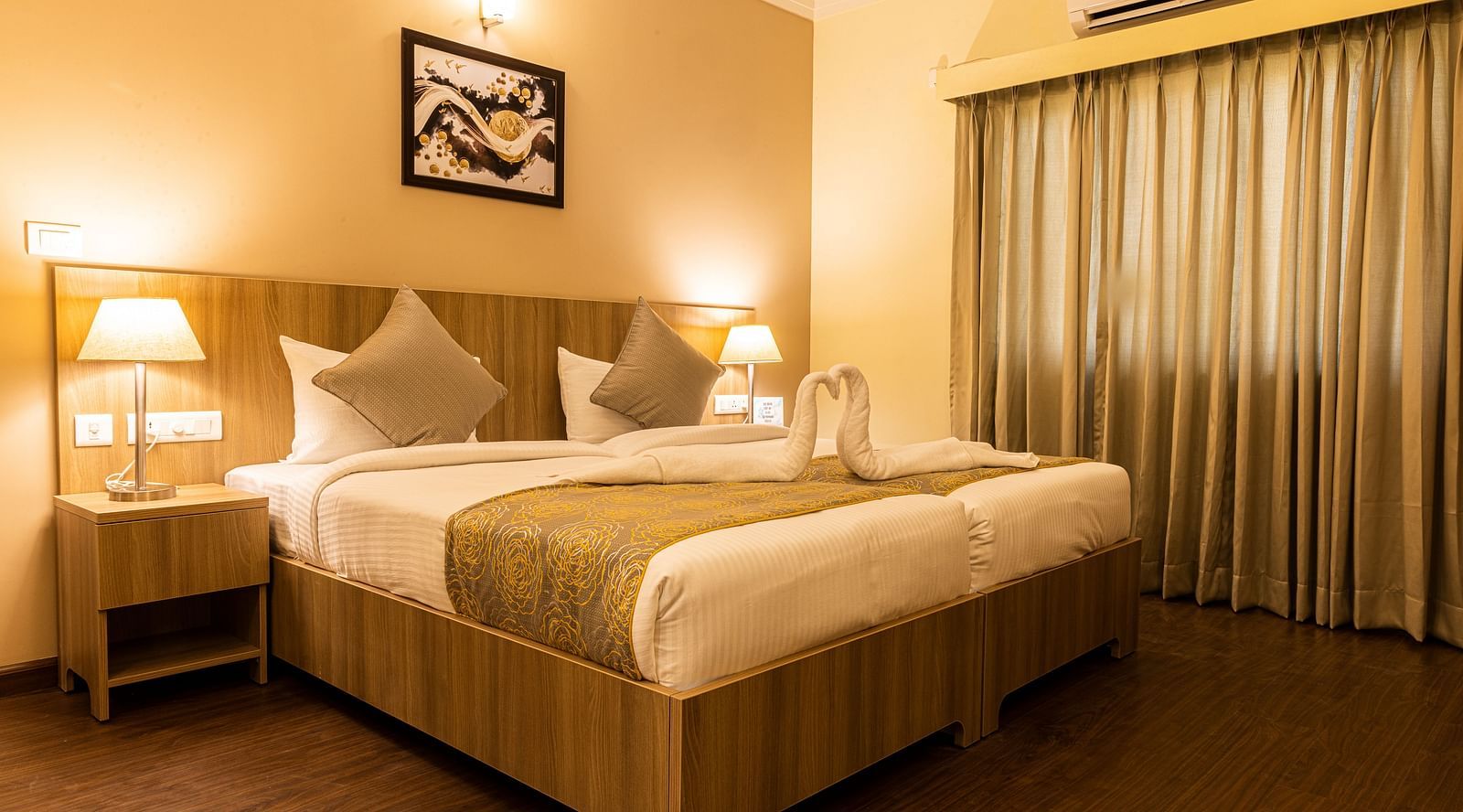 A double bed inside Premium One Bedroom Suite - Starlit Suites, Tirupati