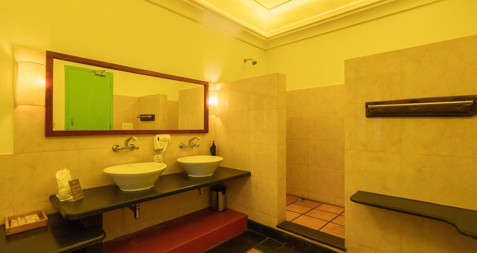 Suite Washroom with two wash basins and  shower area.