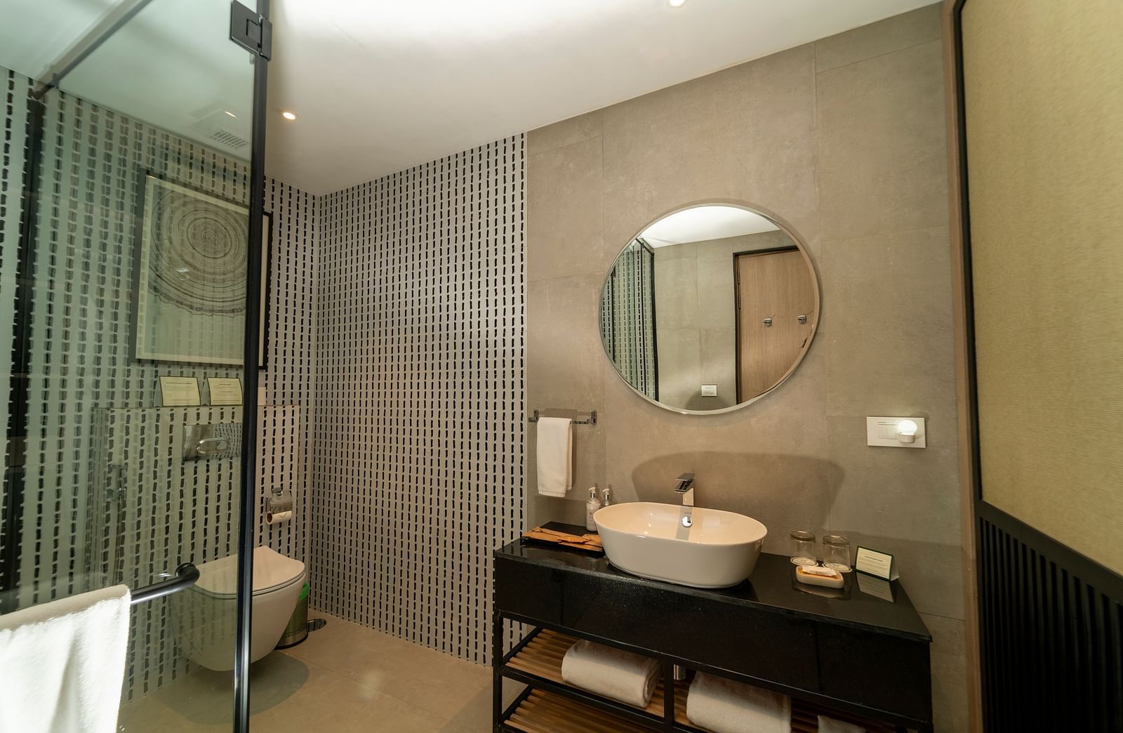 Modern bathroom with sleek vanity and ambient lighting at Nivasana Manali.