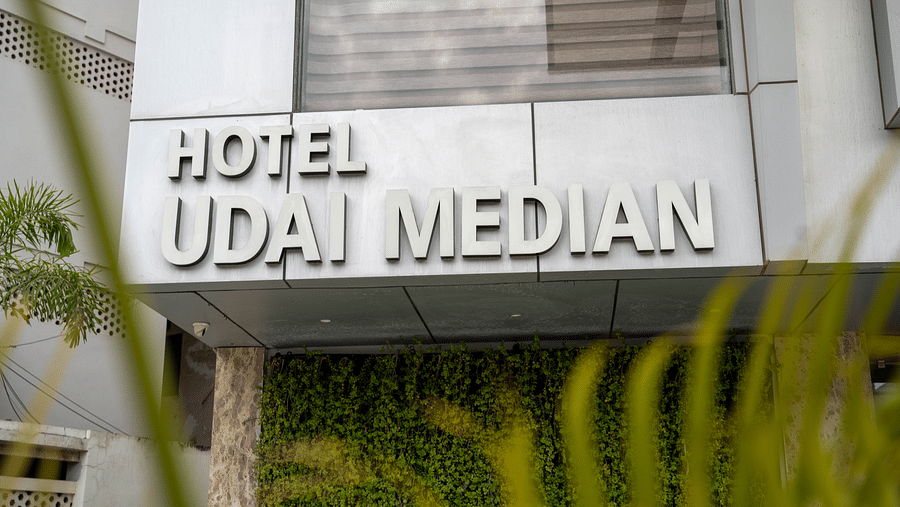 Facade shot of Hotel Udai Median, Udaipur with greenery in the front.