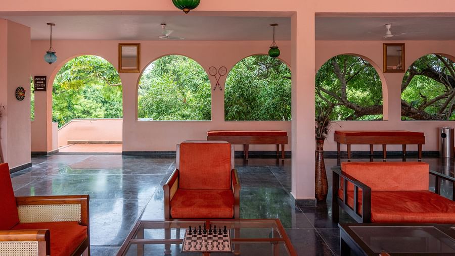 Restaurant seating area with tables and chairs.