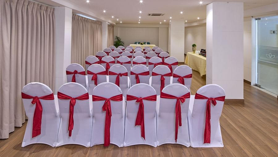 A theatre style seating arrangement in Blossom banquet hall with ambient lighting and centralised air-conditioning - Grand Continent, Brookefield