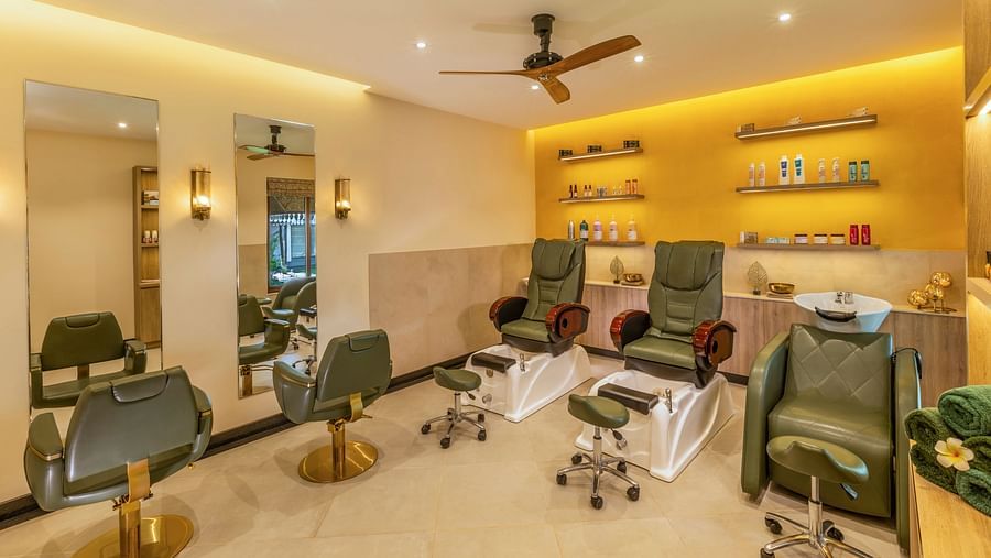 Modern indoor salon with massage chairs, bright lighting, and stylish interiors.