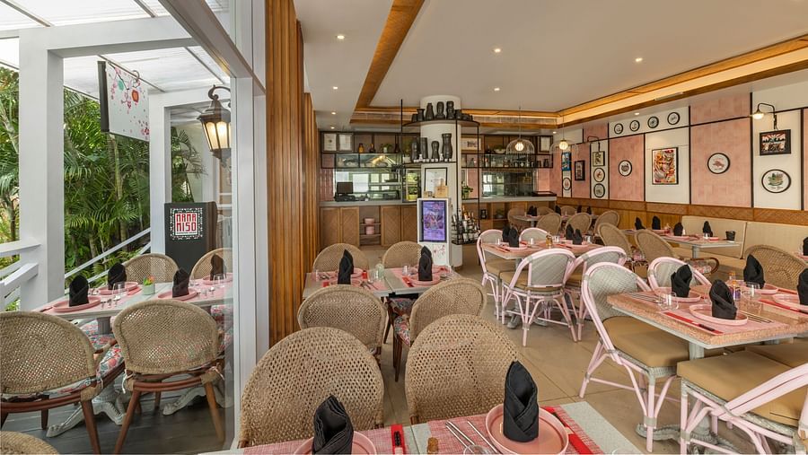 Modern dining space with vibrant decor at Heritage Village Resorts & Spa