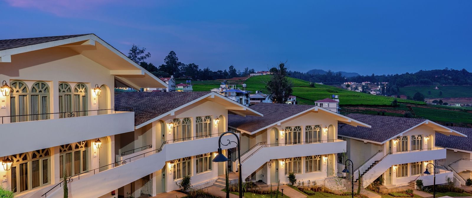A facade of few buildings in a resort | Mango Hill Shola, Ooty